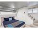 Basement bedroom with plush carpeting and white trim at 2201 Cherry St, Denver, CO 80207
