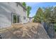 Rear exterior of home featuring spacious deck and railing at 18263 E Mansfield Ave, Aurora, CO 80013
