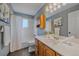Stylish bathroom featuring vanity, shower, and fresh decor at 18263 E Mansfield Ave, Aurora, CO 80013