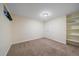 Cozy bedroom with built-in shelving and ample closet space at 18263 E Mansfield Ave, Aurora, CO 80013