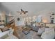 Comfortable living area with hardwood floors and stylish furnishings, perfect for relaxing at 18263 E Mansfield Ave, Aurora, CO 80013