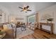 Bright living room with hardwood floors, comfortable seating, and stylish decor at 18263 E Mansfield Ave, Aurora, CO 80013
