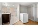 Modern bathroom with dual vanity, granite countertops, and tiled walk-in shower at 4941 Nassau W Cir, Cherry Hills Village, CO 80113