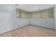 Cozy bedroom featuring hardwood flooring and ample natural light at 22453 Hillcrest Cir, Golden, CO 80401