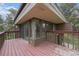 A beautiful sunroom with outdoor deck and sliding door offers scenic views at 22453 Hillcrest Cir, Golden, CO 80401