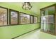 Bright hallway with large windows offering scenic views of the outdoors at 22453 Hillcrest Cir, Golden, CO 80401