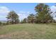 Expansive and serene property view showcases the natural beauty of the surroundings at 22453 Hillcrest Cir, Golden, CO 80401