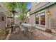 Outdoor patio seating area with a grill and heater, perfect for relaxing or entertaining at 635 N Williams St, Denver, CO 80218