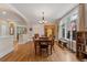 Charming dining room with hardwood floors, wainscoting and lots of natural light at 635 N Williams St, Denver, CO 80218