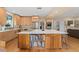 Open-concept kitchen with a large island, custom cabinetry, and seamless integration with the living spaces at 635 N Williams St, Denver, CO 80218