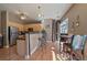 Stylish breakfast nook with a view of a window, a breakfast bar, and stainless steel appliances at 5677 S Park Pl # A110, Greenwood Village, CO 80111