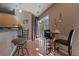 Bright breakfast nook with seating near a window that provides natural light at 5677 S Park Pl # A110, Greenwood Village, CO 80111