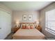 Bright bedroom featuring ample natural light, a cozy bed, and a neutral color scheme at 12208 W Dorado Pl # 207, Littleton, CO 80127