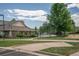 View of community amenities with the pool area and sand volleyball court at 12208 W Dorado Pl # 207, Littleton, CO 80127