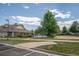 View of community amenities with the pool area and sand volleyball court at 12208 W Dorado Pl # 207, Littleton, CO 80127