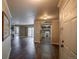 Bright living room showcasing the open layout into the kitchen and a cozy fireplace at 12208 W Dorado Pl # 207, Littleton, CO 80127