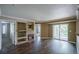 Living room features a fireplace and balcony access with great natural lighting at 12208 W Dorado Pl # 207, Littleton, CO 80127