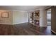 Bright living room features hardwood floors and cozy fireplace, perfect for entertaining at 12208 W Dorado Pl # 207, Littleton, CO 80127