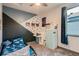 Fun bedroom featuring themed decor, a playful bed, and ample storage at 6792 Canosa St, Denver, CO 80221
