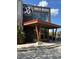 Modern brewery with a covered entrance and ample windows allowing for natural light at 6792 Canosa St, Denver, CO 80221