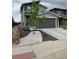 Charming two-story home with a well-maintained lawn and curb appeal at 6792 Canosa St, Denver, CO 80221