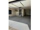 Spacious garage featuring a sealed floor, storage system, and an interior access door at 6792 Canosa St, Denver, CO 80221