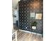 Hallway area with star pattern wall and modern decorations at 6792 Canosa St, Denver, CO 80221