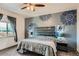Relaxing main bedroom with stylish headboard, bedside tables, and soft, natural light at 6792 Canosa St, Denver, CO 80221