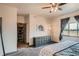 Spacious main bedroom featuring a walk-in closet and window with a view at 6792 Canosa St, Denver, CO 80221