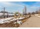 Scenic view of a community park featuring sculptures and walking path, offering a blend of art and nature at 1236 N Tennyson St, Denver, CO 80204