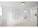 Finished basement with neutral carpet, closet, and an open door that leads to a bathroom at 456 Cherry St, Denver, CO 80220