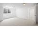 Bright and open basement featuring neutral carpet, egress window, and ample space to be personalized at 456 Cherry St, Denver, CO 80220
