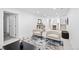 Basement living room featuring bar area and stylish seating arrangements at 456 Cherry St, Denver, CO 80220