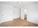 Bedroom with attached bathroom and hardwood flooring at 456 Cherry St, Denver, CO 80220