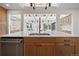 Open concept kitchen with stainless steel appliances and large island with sink at 456 Cherry St, Denver, CO 80220