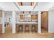 Kitchen features an expansive island with barstool seating and white countertops at 456 Cherry St, Denver, CO 80220