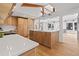 Open-concept kitchen featuring stainless steel appliances and center island with modern sink at 456 Cherry St, Denver, CO 80220