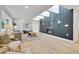 Sunlit living room featuring a fireplace, skylights, and comfortable seating at 456 Cherry St, Denver, CO 80220