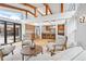 Open concept living room with view of kitchen, bar and chairs at 456 Cherry St, Denver, CO 80220