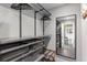 Organized walk-in closet with shelving and drawers for optimal storage space, located off the main bedroom at 592 Brook Dr, Idaho Springs, CO 80452