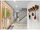 Bright foyer with light walls, tile floors, and glass doors that flood the space with natural light at 592 Brook Dr, Idaho Springs, CO 80452