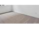 Neutral bedroom featuring cozy carpet and ample natural light at 8607 Yellowcress St, Littleton, CO 80125