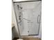 This bathroom features a fully tiled shower with white sliding glass door at 8335 Fairmount Dr # 8-206, Denver, CO 80247