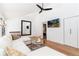 Bright living room featuring modern decor, hardwood floors, and a stylish sectional sofa at 1065 S Monroe St, Denver, CO 80209