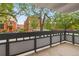 This balcony has a great view with lots of surrounding trees and a view of buildings across the street at 555 E 10Th Ave # 111, Denver, CO 80203