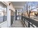 Relax on this spacious balcony offering views of the surrounding neighborhood at 555 E 10Th Ave # 111, Denver, CO 80203