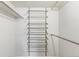 Walk-in closet featuring adjustable shelving, maximizing storage space at 555 E 10Th Ave # 111, Denver, CO 80203