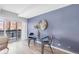 Light-filled dining area with balcony access and modern decor at 555 E 10Th Ave # 111, Denver, CO 80203