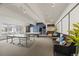Well-equipped game room with a ping pong table, comfortable seating, and ample lighting at 555 E 10Th Ave # 111, Denver, CO 80203