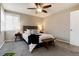 Serene bedroom featuring a cozy bed, ceiling fan, and bedside tables with lamps, creating a relaxing atmosphere at 377 Stuart St, Denver, CO 80219